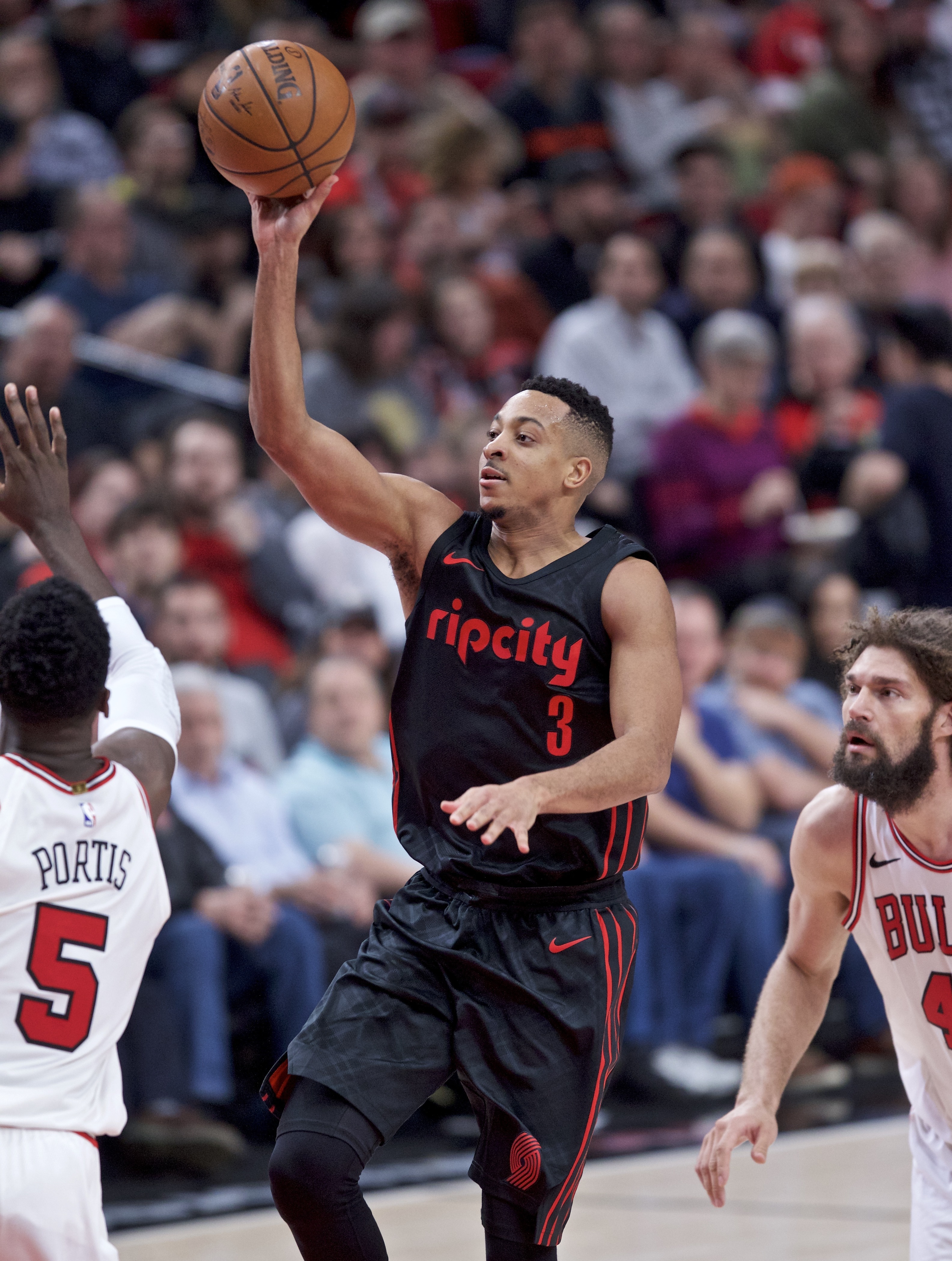 CJ McCollum, Bobby Portis, Robin Lopez