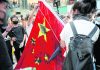 Hong Kong protesters trample Chinese flag, set street fires