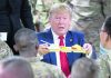 Trump visits troops in Afghanistan, says Taliban want deal