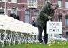 MH17 relatives protest against Russia with 298 empty chairs