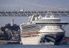 Infected cruise ship unloads passengers in California