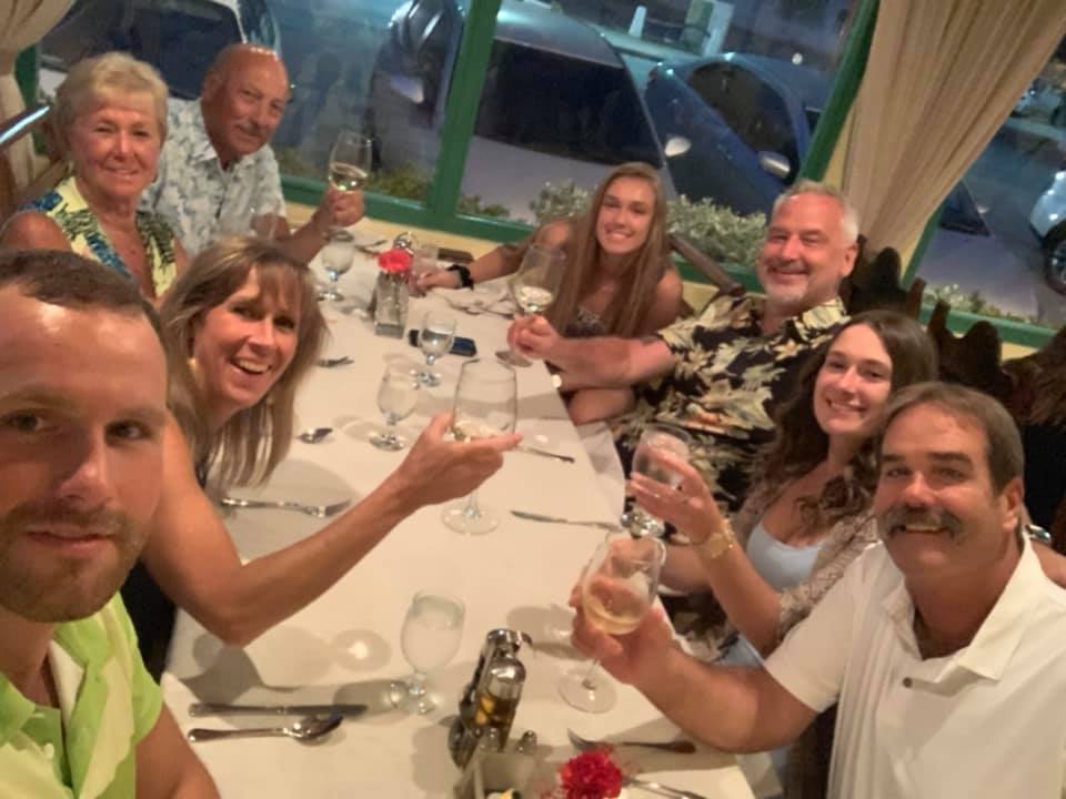 Image may contain: 8 people, people sitting and indoor