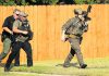Hostage situation after Texas officers shot ends peacefully