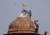 Angry farmers storm India’s Red Fort in challenge to Modi