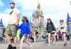 Mickey’s flashy dress, glowing castle mark Disney World 50th