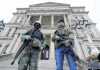 Guns in capitol buildings divide states after armed protests