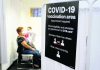 Americans vaccinated against COVID-19 still wait for advice
