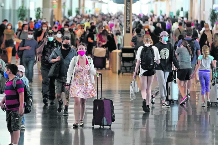Virus Outbreak Holiday Travel