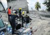 Rescuers racing in Haiti as storm threatens to follow quake