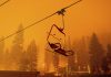 Thousands rush to flee Lake Tahoe resort city as fire nears