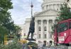Workers reinstall Wisconsin statues downed in 2020 protest