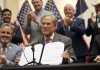 Texas governor signs new GOP voting restrictions into law