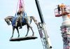 Statue of Gen. Robert E. Lee comes down in Virginia capital