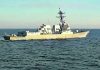 Russia says it pushed U.S. destroyer from area near its waters
