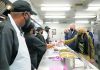 President, VP and spouses to help food kitchen for holiday