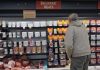 US shoppers find some groceries scarce due to virus, weather