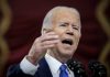 Biden decries Trump backers’ ‘dagger at throat’ of democracy