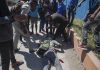 3 wounded as police clash with Haiti factory workers