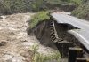 Yellowstone flooding sweeps away bridge, washes out roads