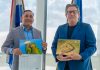Aruba Birdlife Calendar 2023 handed to minister of Nature