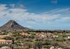 Enjoy one of the best views on Aruba at the top of the Hooiberg Hill
