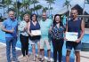 Aruba Tourism Authority honored loyal visitors at Manchebo Beach Resort & Spa; Timo Sven Schubert & Kenneth & Doreen Holt