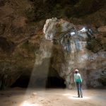 Woman in Quadirikiri Cave, Arikok National Park, Aruba