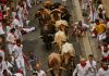 Thousands take part in first running of the bulls in Spain’s San Fermin festival