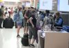 Squeezing in one last summer trip over Labor Day weekend? Expect crowded airports and full flights