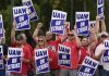 More Americans support striking auto workers than car companies, an AP-NORC poll shows