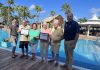 The Aruba Tourism Authority honors loyal visitors at Manchebo Beach Resort & Spa! Mr. Thomas & Mrs. Kay Baxter and Mr. Joseph & Mrs. Carole Forgione