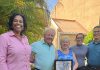 Aruba Tourism Authority honors a loyal visitor at Divi Dutch Village; Mrs. Joanne Trojak