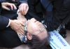 South Korean opposition leader is stabbed in the neck