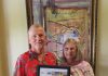 The Aruba Tourism Authority honor loyal visitors on the island; Gerald and Linda Darfler and Luc Anthony Zito