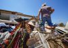 In a north Texas county, dazed residents sift through homes mangled by a tornado