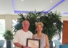 The Aruba Tourism Authority honor loyal visitors on the island! Roland and Donna Lacerte