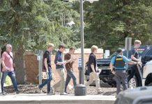 Denver school shooting suspect posted online about mass shootings and neo-Nazi views, report says