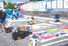 Parking spots used as colorful protest against Florida crackdown on rainbow crosswalks