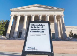 Judge temporarily blocks the Trump administration from firing workers during the government shutdown