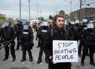 Judge hears testimony about crowded cells and overflowing toilets at Chicago-area immigration site