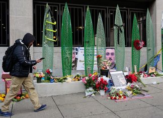 National Guard member shot in DC has shown positive signs, West Virginia governor says