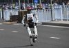 Humans far behind as robot breaks record at Beijing half marathon