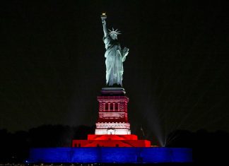 Statue of Liberty dazzles with lasers, music for U.S. anniversary
