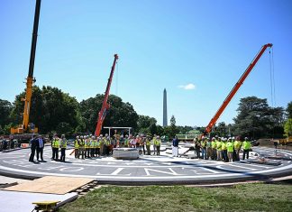 Trump unveils White House helipad as building frenzy escalates