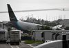Amazon cargo plane overshoots Miami runway, hits vehicles, catches fire