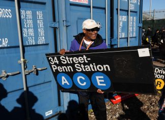 New Yorkers snap up discarded subway signs, seats at annual sale
