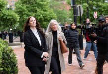 U.S. judge says firing of daughter of former FBI director unlawful
