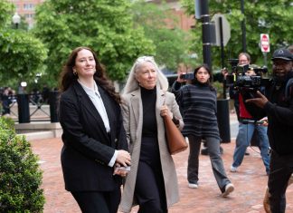 U.S. judge says firing of daughter of former FBI director unlawful