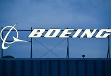 Boeing shares tumble after it releases cautious growth forecast